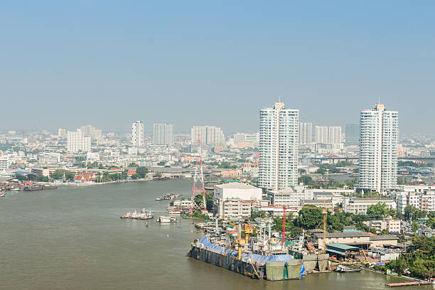 istock Shipyard and city building. 528877675