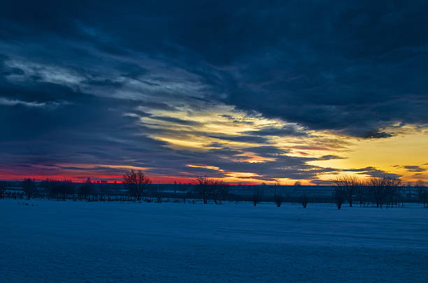 istock Dramatic sunset near a small village. 528879665