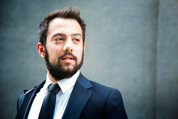 istock Bearded Turkish businessman looking away 528884913
