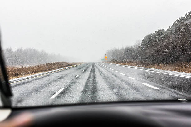 istock Highway Driving In Heavy Ontario Canada Blizzard Snow 528885019
