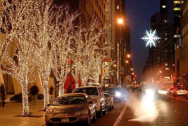 Holiday lights and Christmas ornaments along 57th Street, New York stock photo