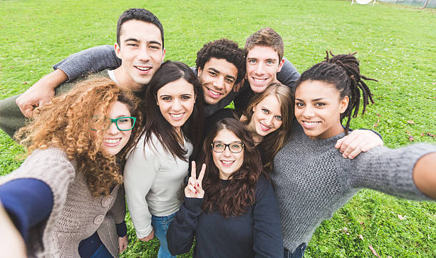istock Multiethnic Group of Friends Taking Selfie at Park 528889939