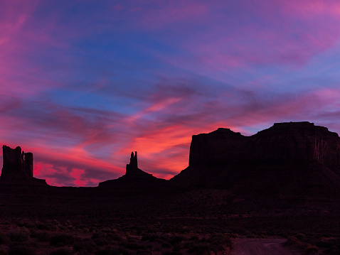 United States. State of Arizona. Monument Valley at sunset. Monument Valley is a region of the Colorado Plateau. Its Navajo name, Tsé Biiʼ Ndzisgaii, means \