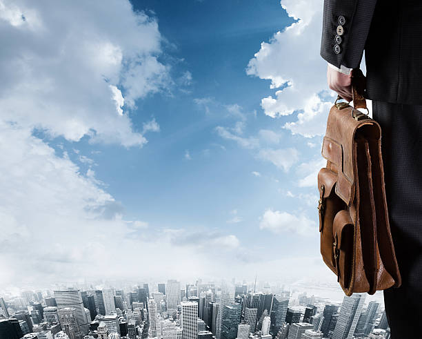 istock Businessman looking towards the city 528892087