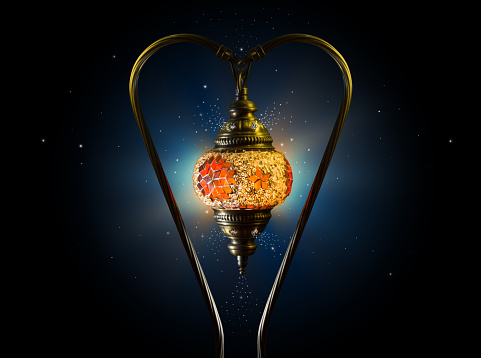 A heart-shaped lantern with stars flowing from it. Great for Islamic greeting card backgrounds