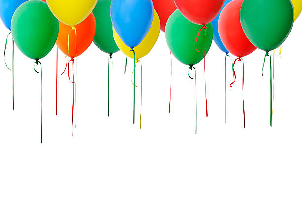istock Isolated shot of multicolored balloons floating against white background 528892507