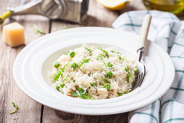 istock Homemade risotto with chicken, green peas, arugula and parmesan 528893688