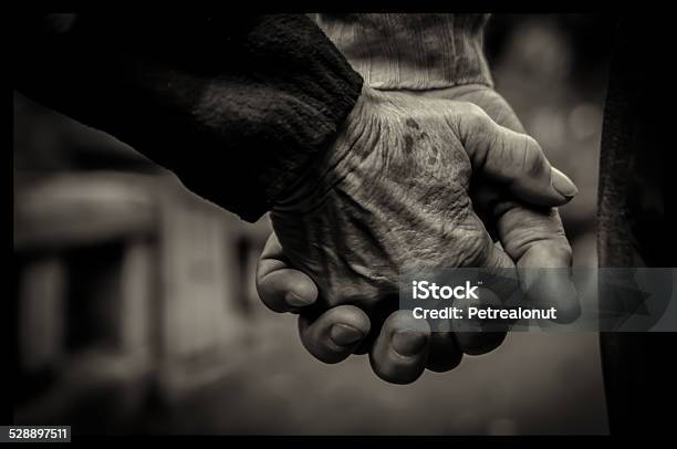 Old Couple Holding Hands Stock Photo - Download Image Now - Black And White, Couple - Relationship, Senior Adult