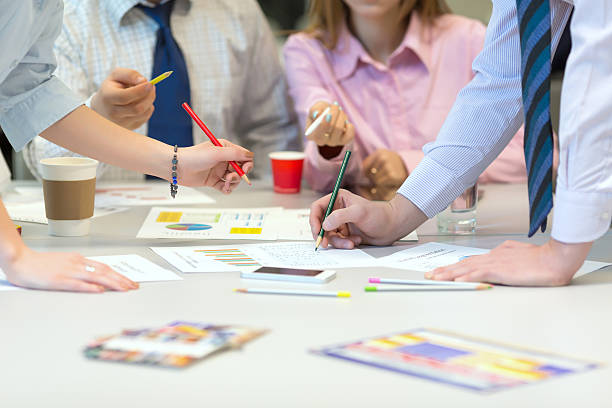 istock Team Job Business Concept - People discussing Presentation Data 528898406