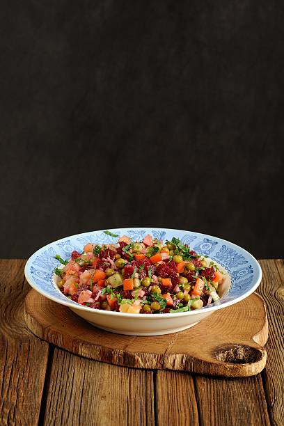 istock Russian beetroot salad vinegrette in blue plate 528898851