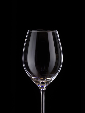 Red wine glass silhouette isolated on black