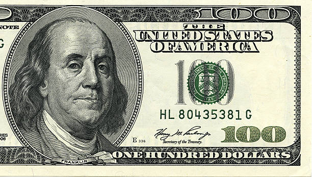 One hundred dollar bill macro shot. One hundred dollar bill macro shot. Benjamin Franklin as depicted on the bill. number 100 stock pictures, royalty-free photos & images