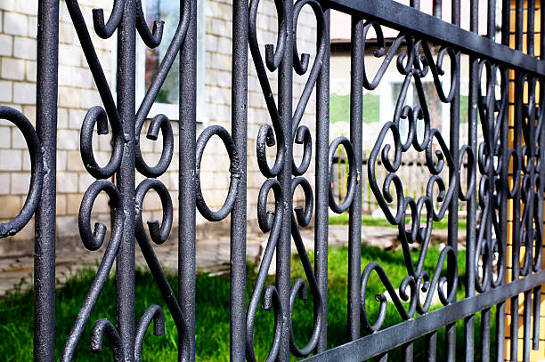istock forged black fence 528900406
