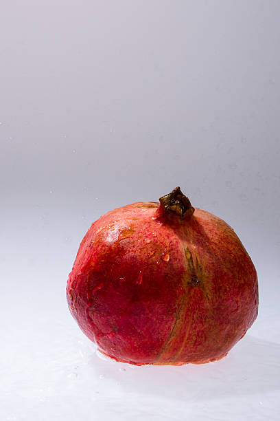 istock Closeup of whole pomegranate 528901814