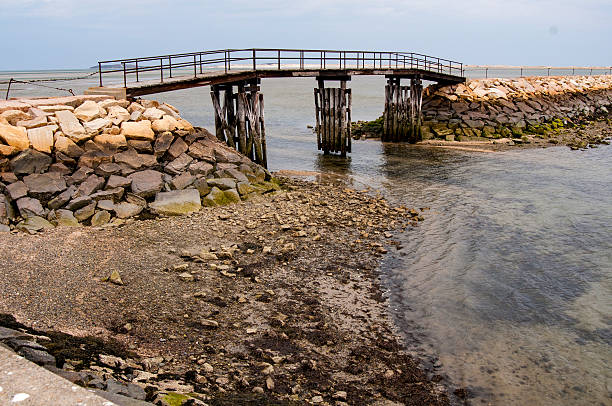 istock Falling tide at Plymouth breakwater 528904812