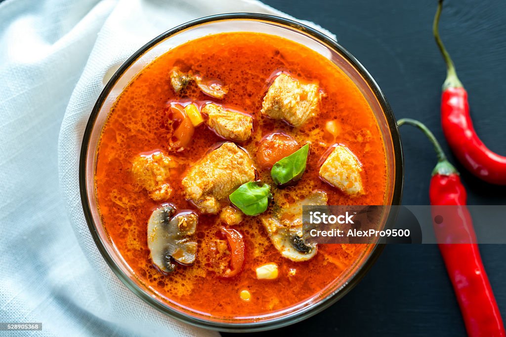 Thai red chicken curry Heat - Temperature Stock Photo