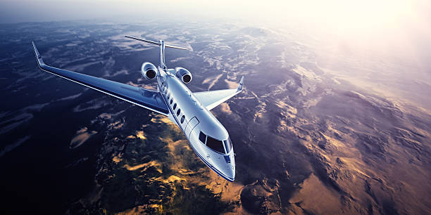 istock Realistic photo of silver generic design private Jet flying over 528906388