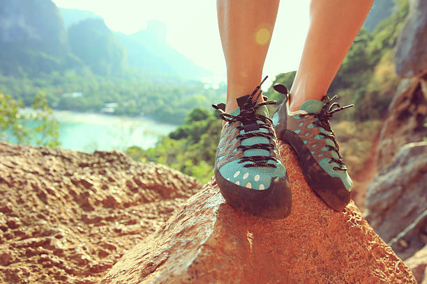 istock one young woman rock climber  on rock 528906778