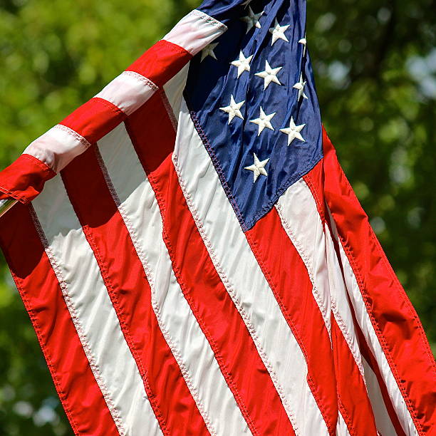 istock American flag outdoor view on sunny day 528907013