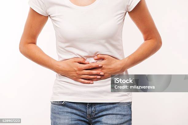 Woman Is Having Stomach Ache Stock Photo - Download Image Now - Stomachache, Adult, Backgrounds