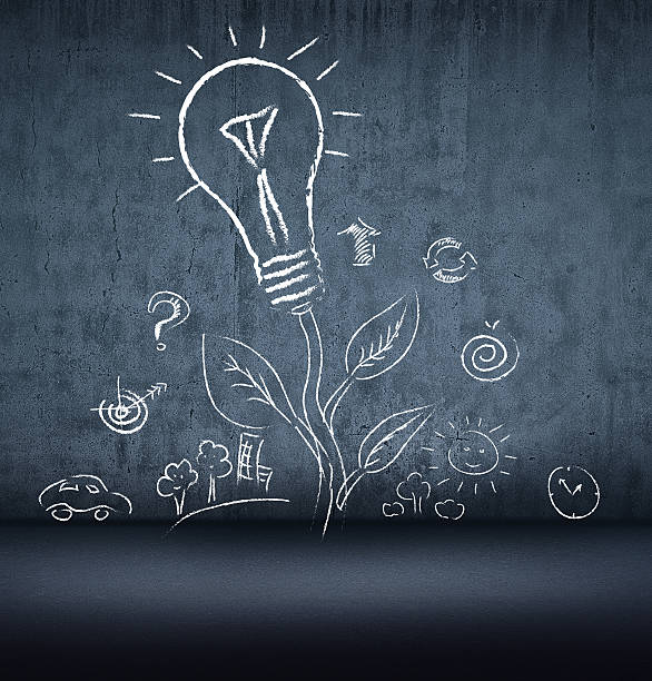 istock flower growing from wall in the head with a lamp. 528907403