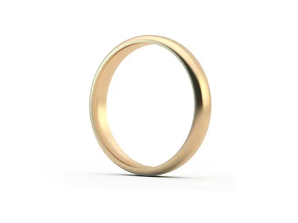 Gold wedding ring. Great use for wedding, love and romance concepts. Isolated on white background. Clipping path is included.