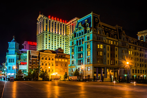 Buildings on the boardwalk at night in Atlantic City, New Jersey.
