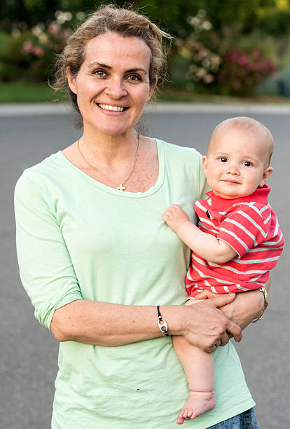 istock Mature woman posing with her Baby 528908954