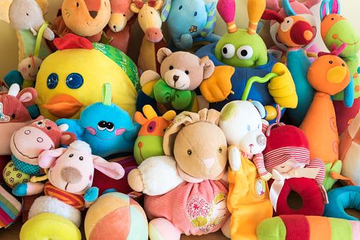 Soft toys in a child's bedroomToy Box full of soft toys in a child's bedroom