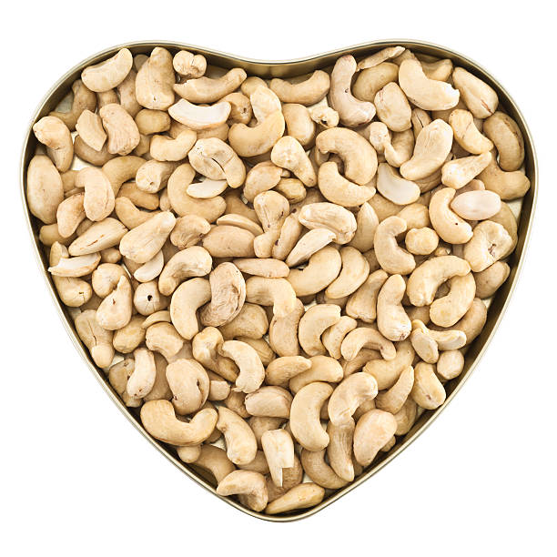 istock Heart shaped box full of peanuts 528909312