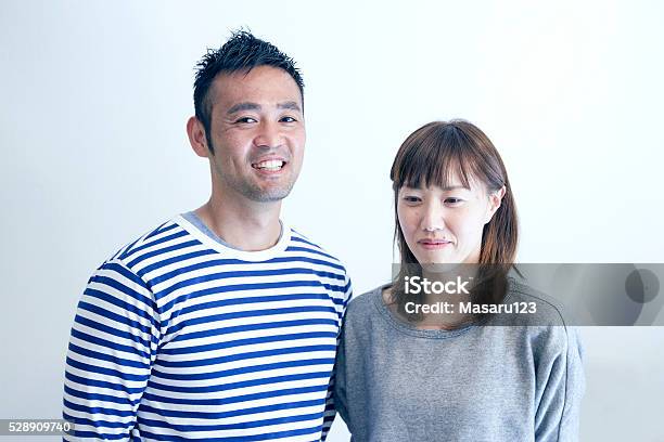 Couple Standing Side By Side Stock Photo - Download Image Now - Japan, Married, Real People