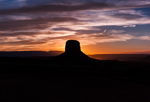 United States. State of Arizona. Monument Valley at sunset. Monument Valley is a region of the Colorado Plateau. Its Navajo name, Tsé Biiʼ Ndzisgaii, means 