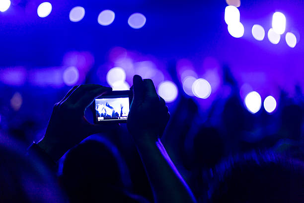 istock rock concert with smartphone 528910795
