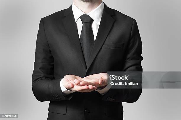 Businessman Begging Gesture Black Suit Stock Photo - Download Image Now - Adult, Bankruptcy, Black Color