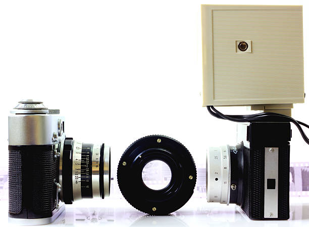 istock Retro cameras and flash isolated on white background 528911956