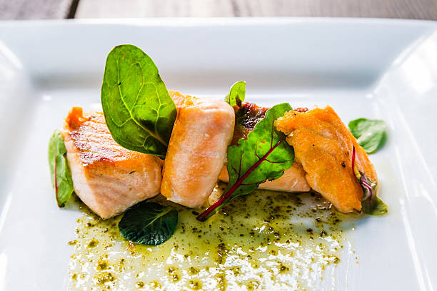 istock Plate of salmon and arugula 528912756