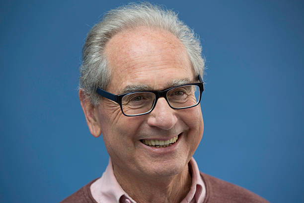 istock senior businessman smiling 528914872