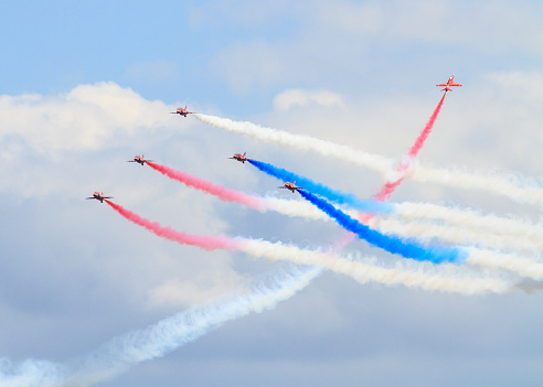 Silverstone, England - July 4, 2015:  RAF aerobatics display team the Red Arrows give a display prior to qualifying for the British Grand Prix.