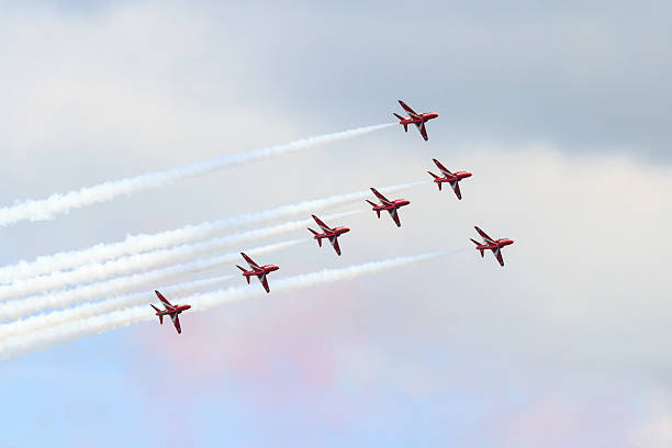 The Red Arrows Silverstone, England - July 4, 2015:  RAF aerobatics display team the Red Arrows give a display prior to qualifying for the British Grand Prix. silverstone stock pictures, royalty-free photos & images