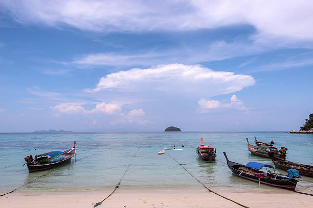 istock Long-tailed boat on  beach (Bundhaya) Koh Lipe 528917626