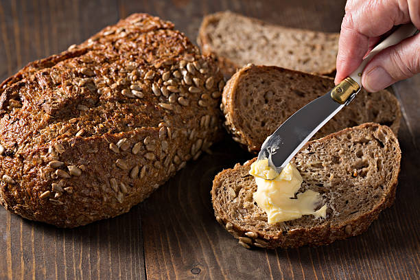 istock Healthy Whole Grain Bread And Fresh Butter 528919340