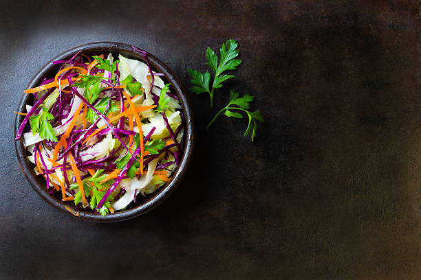 istock Fresh vegetables salad purple cabbage, lettuce, carrot. Top view 528920082