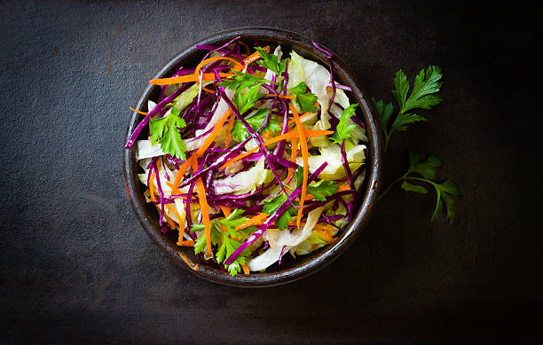 istock Fresh vegetables salad purple cabbage, lettuce, carrot. Top view 528920318