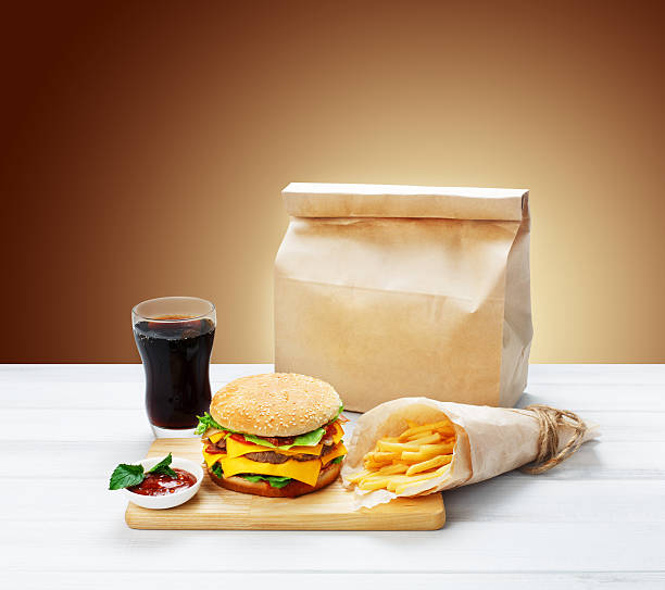 istock Fast food take away. Hamburger, cola and fries 528921220