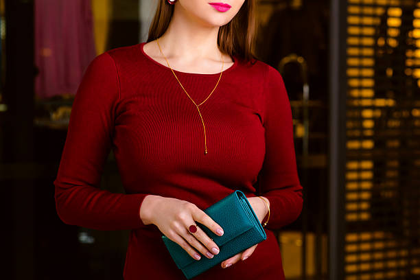 istock handsome woman holding wallet. Shopping center, 528921312