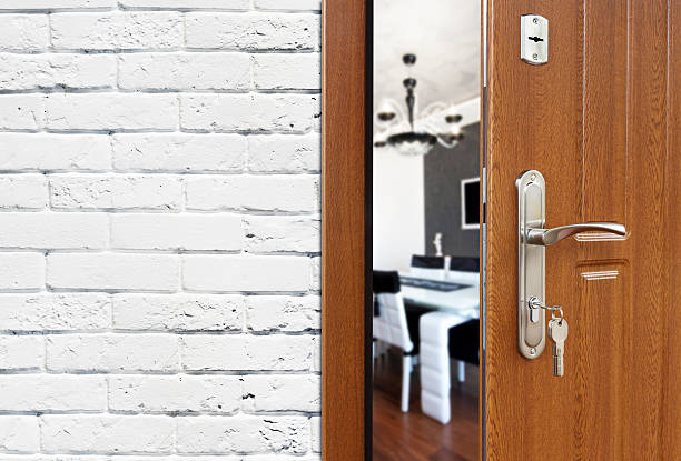 istock Half open door of a modern kitchen closeup 528922394