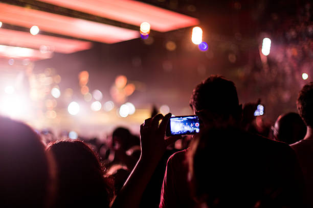 istock rock concert with smartphone 528927449