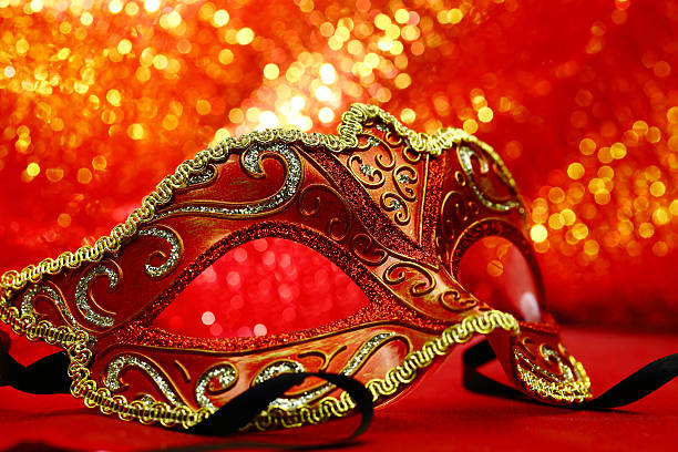 istock Vintage carnival mask in front of glowing background 528928261
