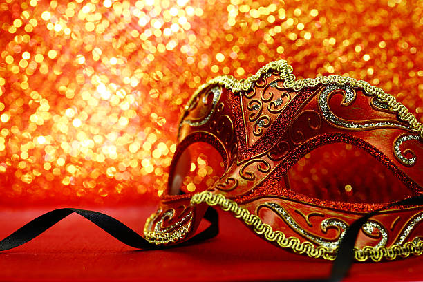 istock Vintage carnival mask in front of glowing background 528928265