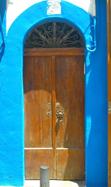 istock Ibiza, Spain. Colored door 528929231